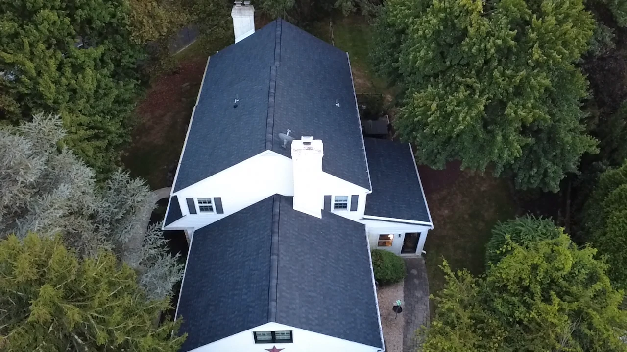 Drone view of a residential roof replacement by DMS Contractors in Bucks County, PA
